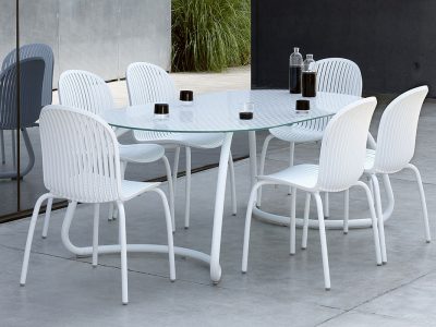 Loto Dinner table with tempered Float glass top & Aluminium legs.