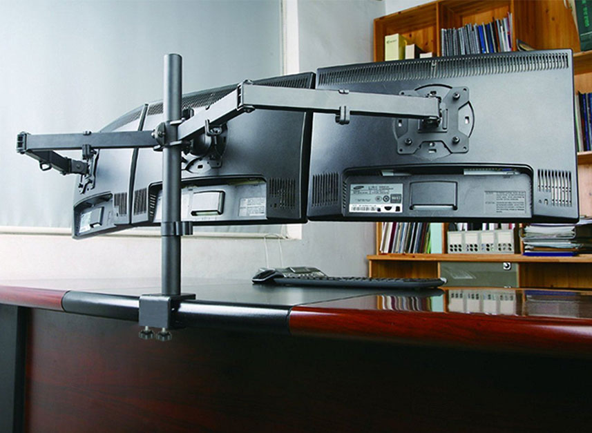 STRATA PRO - Advanced Monitor Arms. Supporting Three Monitors. 2 Strata-Triple-Monitor-Arms